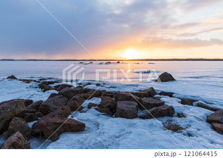 Granite rocks are covered with snow. Winter landscape 121064415