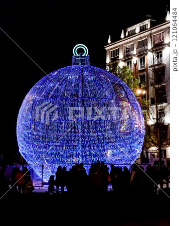 Christmas. Light. Christmas lights through the streets of Madrid. Decorating streets of the city. Fir tree with Christmas lights. Christmas ball. On. MADRID. SPAIN. 11 December 2024. Christmas. Light. Christmas lights through the streets of Madrid. Decorating streets of the city. Fir tree with Christmas lights. Christmas ball. On. MADRID. SPAIN. 11 December 2024. 121064484