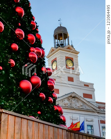 Christmas. Light. Christmas lights through the streets of Madrid. Decorating streets of the city. Fir tree with Christmas lights. Christmas ball. On. MADRID. SPAIN. 11 December 2024. 121064495