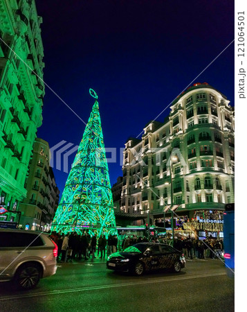 Christmas. Light. Christmas lights through the streets of Madrid. Decorating streets of the city. Fir tree with Christmas lights. Christmas ball. On. MADRID. SPAIN. 11 December 2024. Christmas. Light. Christmas lights through the streets of Madrid. Decorating streets of the city. Fir tree with Christmas lights. Christmas ball. On. MADRID. SPAIN. 11 December 2024. 121064501