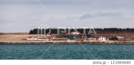 Iceland. Panoramic rural landscape with small residential houses Iceland. Panoramic rural landscape with small residential houses 121064680