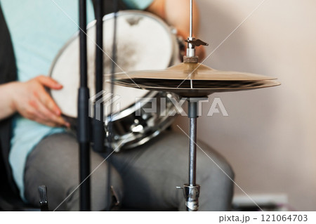Drummer plays a snare drum with hands. Live music 121064703