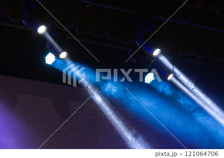 Beams of scenic spot lights in smoke over dark background Beams of scenic spot lights in smoke over dark background 121064706