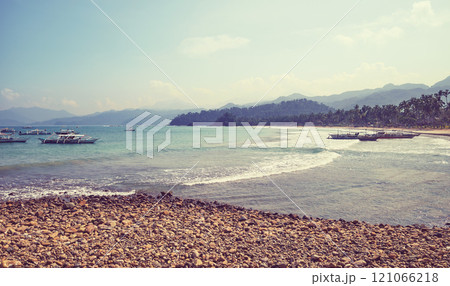 Scenic beach on Palawan island, color toning applied, Philippines. Scenic beach on Palawan island, color toning applied, Philippines. 121066218