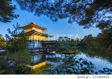Beautiful of Kinkakuji temple or the golden Pavilion by the the pond surrounded with Japanese garden in Autumn season at Kyoto,Japan 121066691