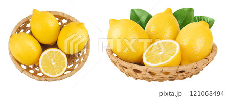 Ripe lemons in wicker basket isolated on white background. Top view. Flat lay. 121068494