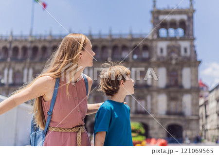 Mother and teenage son tourists in the central square of Mexico City, Zocalo. Family travel, cultural exploration, and historic architecture concept 121069565