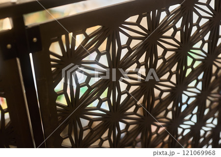Decorative Metal Screen Featuring an Intricate Pattern That Beautifully Displays Light Decorative Metal Screen Featuring an Intricate Pattern That Beautifully Displays Light 121069968
