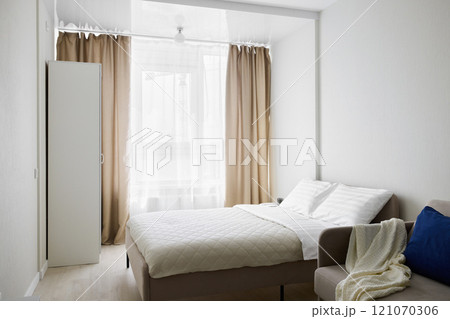 Explore the beauty of Modern Minimalist Bedroom Interior Design enhanced with Natural Light Explore the beauty of Modern Minimalist Bedroom Interior Design enhanced with Natural Light 121070306