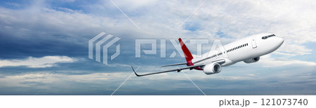 Commercial airplane flying in the sky with cloudscapes background Commercial airplane flying in the sky with cloudscapes background 121073740