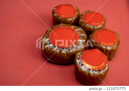 Chinese New Year rice cake or Nian Gao on the table. Also popular as Kue Keranjang or Dodol China 121073775