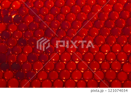 Red water gel balls. Polymer gel. Silica gel. Balls of hydrogel round shape. Crystal liquid ball with reflection. Water beads Red water gel balls. Polymer gel. Silica gel. Balls of hydrogel round shape. Crystal liquid ball with reflection. Water beads 121074034