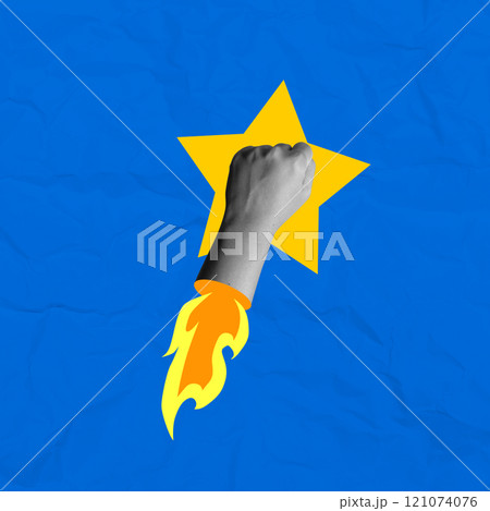 A human hand with a fist and flame flying high on a colored background A human hand with a fist and flame flying high on a colored background 121074076