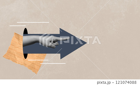 A human hand pointing through the hole with an arrow symbol on a colored background 121074088