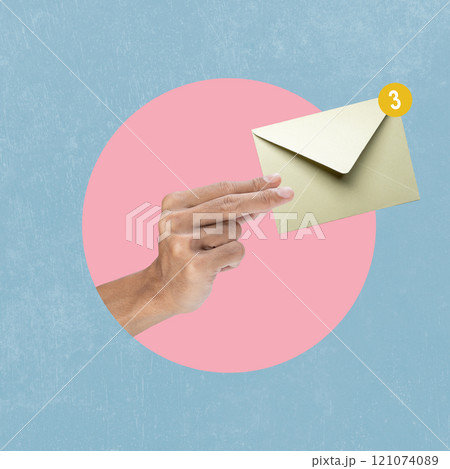 Human hand holding envelope letter with a colored background Human hand holding envelope letter with a colored background 121074089