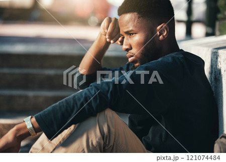Depressed, angry and black man upset, tired and unhappy outdoor in city, stare and frustrated. Mental health, African American male and young guy with problem, fail and depression being disappointed. Depressed, angry and black man upset, tired and unhappy outdoor in city, stare and frustrated. Mental health, African American male and young guy with problem, fail and depression being disappointed. 121074484