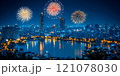 A view of a large metropolis lighting up fireworks to celebrate Christmas and New Year 121078030