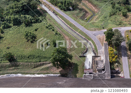 Drainage Khun Dan Prakan Chon Dam reservoir on hill with canal and drainage system water flow to river nature. Drainage Khun Dan Prakan Chon Dam reservoir on hill with canal and drainage system water flow to river nature. 121080493