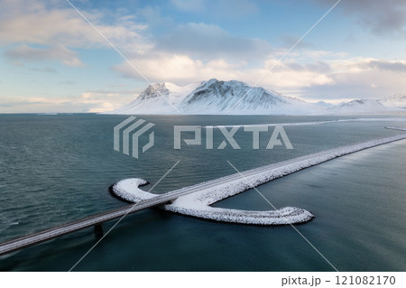 Iceland. Aerial view of the road. View from a drone. Winter landscape from air. 121082170