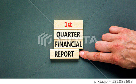 1st quarter financial report symbol. Concept words 1st quarter financial report on beautiful wooden blocks. Beautiful grey background. Business 1st quarter financial report concept. Copy space. 121082698