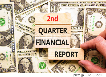 2nd quarter financial report symbol. Concept words 2nd quarter financial report on beautiful wooden blocks. Beautiful dollar background. Business 2nd quarter financial report concept. Copy space. 2nd quarter financial report symbol. Concept words 2nd quarter financial report on beautiful wooden blocks. Beautiful dollar background. Business 2nd quarter financial report concept. Copy space. 121082700