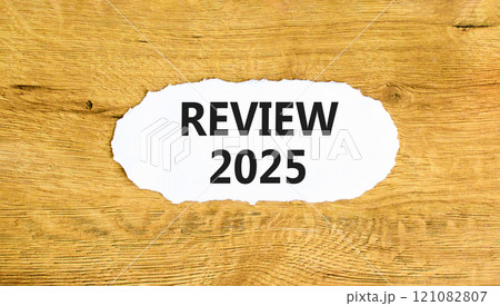 Planning review 2025 new year symbol. Concept words Review 2025 on beautiful white paper. Beautiful wooden background. Business review 2025 new year concept. Copy space. Planning review 2025 new year symbol. Concept words Review 2025 on beautiful white paper. Beautiful wooden background. Business review 2025 new year concept. Copy space. 121082807