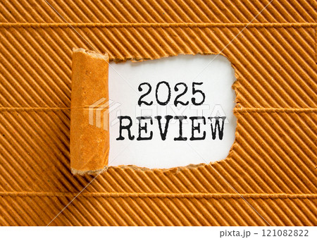Planning 2025 review new year symbol. Concept words 2025 Review on beautiful white paper. Beautiful brown paper background. Business 2025 review new year concept. Copy space. 121082822