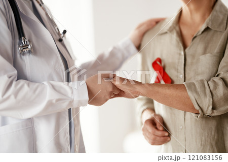 patient and a doctor in medical office patient and a doctor in medical office 121083156