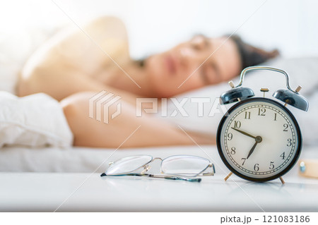 woman is sleeping in the bedroom woman is sleeping in the bedroom 121083186