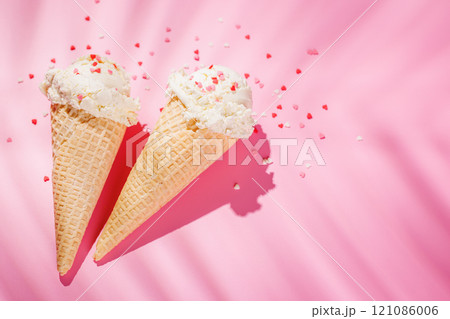 A charming ice cream cones treat adorned with heart-shaped decor 121086006