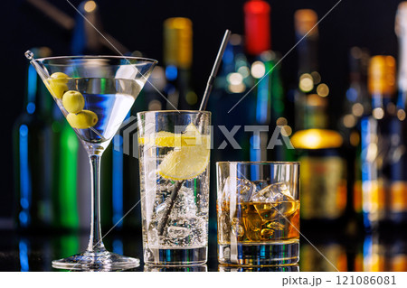 Various cocktails on a bar table 121086081