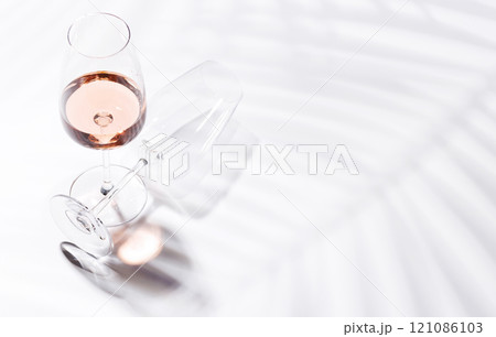 A glass of rose wine 121086103