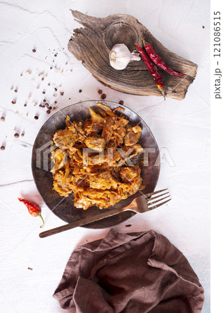 Stewed or braised cabbage served in a plate 121086515