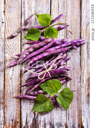 raw bean on light wooden table raw bean on light wooden table 121086858