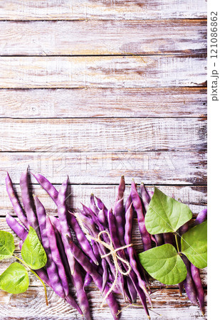 raw bean on light wooden table raw bean on light wooden table 121086862