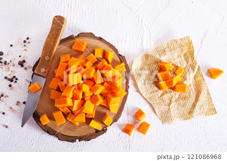 raw pumpkin cubes on board raw pumpkin cubes on board 121086968