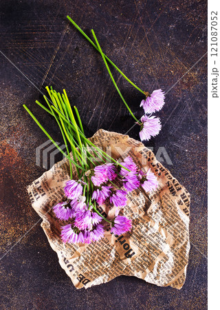 fresh allium flowers on a table fresh allium flowers on a table 121087052