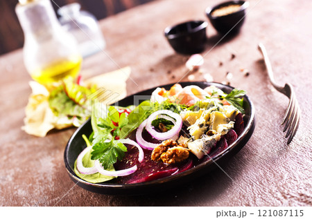 beetroot salad with cheese, walnuts, onion 121087115