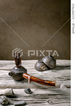 Ceramic teapot with wooden handle Ceramic teapot with wooden handle 121087422