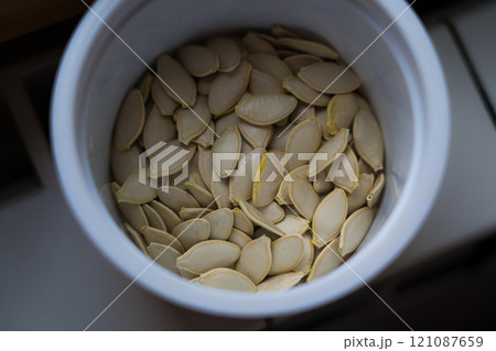 Pumpkin seeds in a jar. Dried Pumpkin Seeds Pumpkin seeds in a jar. Dried Pumpkin Seeds 121087659