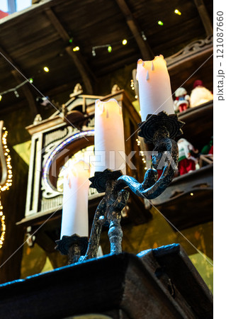 A huge candlestick and candles on it. 3 candles on a candlestick, New Year A huge candlestick and candles on it. 3 candles on a candlestick, New Year 121087660