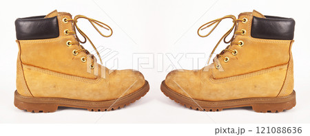 Hiking shoes and a white background, Sturdy hiking boots 121088636