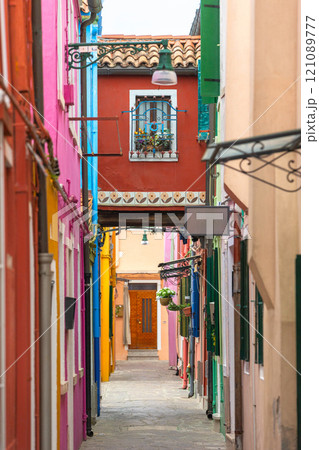 Burano, Italy colorful houses street view 121089777