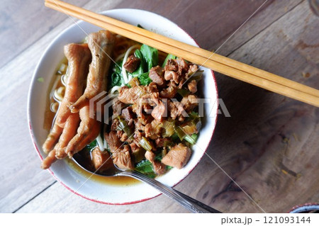One bowl of traditional Indonesian chicken noodles. This food has a rich, spiced taste. One bowl of traditional Indonesian chicken noodles. This food has a rich, spiced taste. 121093144