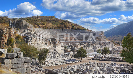 Ancient city ruins of Ephesus in Turkey surrounded by nature. Popular tourism attraction of the remains of well preserved historical stone building from classical greek and roman history and culture Ancient city ruins of Ephesus in Turkey surrounded by nature. Popular tourism attraction of the remains of well preserved historical stone building from classical greek and roman history and culture 121094045