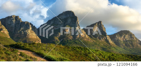 Landscape view of mountains in Hout Bay in Cape Town, South Africa during summer holiday and vacation. Scenic hills, scenery of fresh green flora growing in remote area. Exploring nature and the wild Landscape view of mountains in Hout Bay in Cape Town, South Africa during summer holiday and vacation. Scenic hills, scenery of fresh green flora growing in remote area. Exploring nature and the wild 121094166