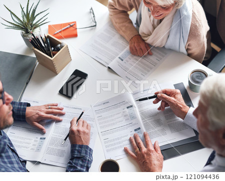 Couple, finance and above with documents in meeting for investment, contract and retirement planning. Budgeting, advice and consulting with financial advisor for estate, policy and asset management Couple, finance and above with documents in meeting for investment, contract and retirement planning. Budgeting, advice and consulting with financial advisor for estate, policy and asset management 121094436