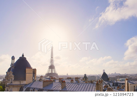 Architecture, rooftop and Eiffel Tower in city of France for structure, building infrastructure and culture. Background, blue sky and mockup with landmark for tourism, travel destination and view 121094723
