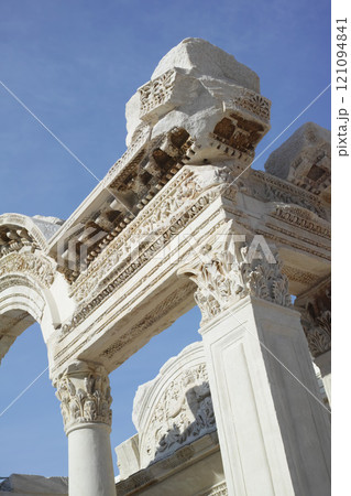 Ancient city ruins of Ephesus in Turkey during the day. Traveling abroad and overseas for holiday, vacation and tourism. Excavated remains of historical Turkish stone cultural building Ancient city ruins of Ephesus in Turkey during the day. Traveling abroad and overseas for holiday, vacation and tourism. Excavated remains of historical Turkish stone cultural building 121094841