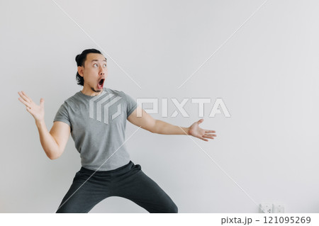 Emotion wow man In grey Isolated on white background. Full body Portrait. Emotion wow man In grey Isolated on white background. Full body Portrait. 121095269